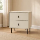 Beige bedside table with two drawers in warm bedroom setting