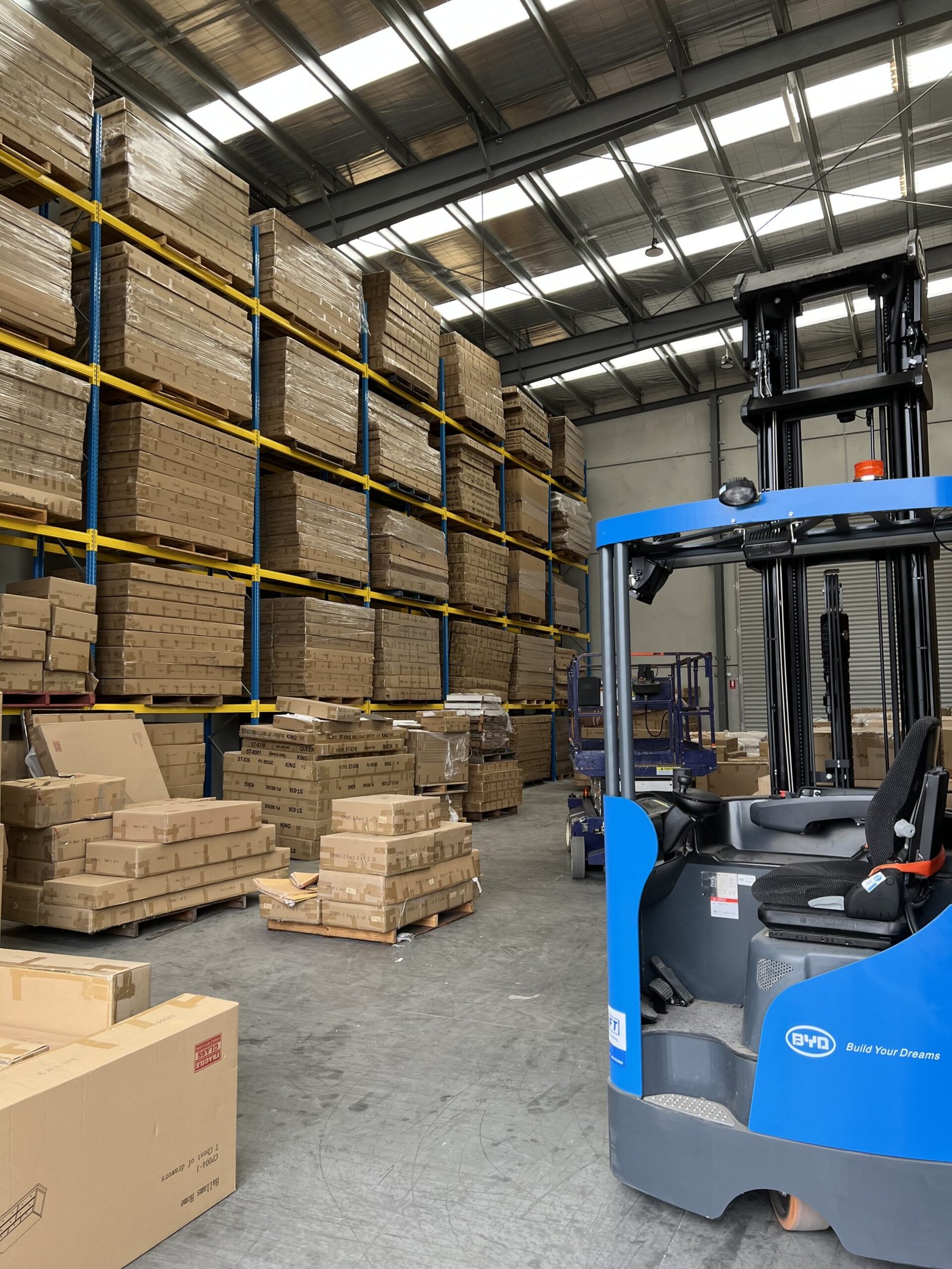 Cozynest Living warehouse stock and forklift