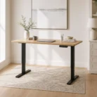 Height adjustable desk with timber top and black frame in warm home office