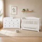 Andy baby cot with Brighton 7 drawer change table package in nursery room scene