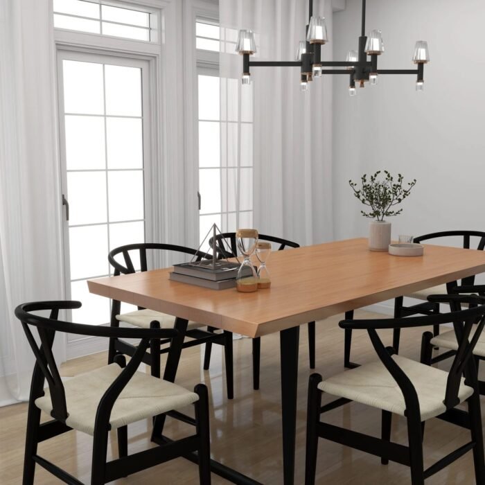 Wooden beveled edge dining table with six chairs in a bright dining room