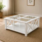 Bridgston style white glass top coffee table in warm living room