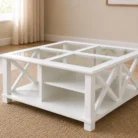Bridgston style white glass top coffee table with visible internal shelf