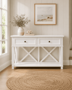 White 130cm console hall table with two drawers styled in a coastal entryway