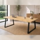 Full room view of natural edge ash wood dining table with black metal legs