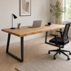 Natural edge ash wood dining table used as a study desk in a bright home office