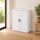 White shoe cabinet in a bright entryway